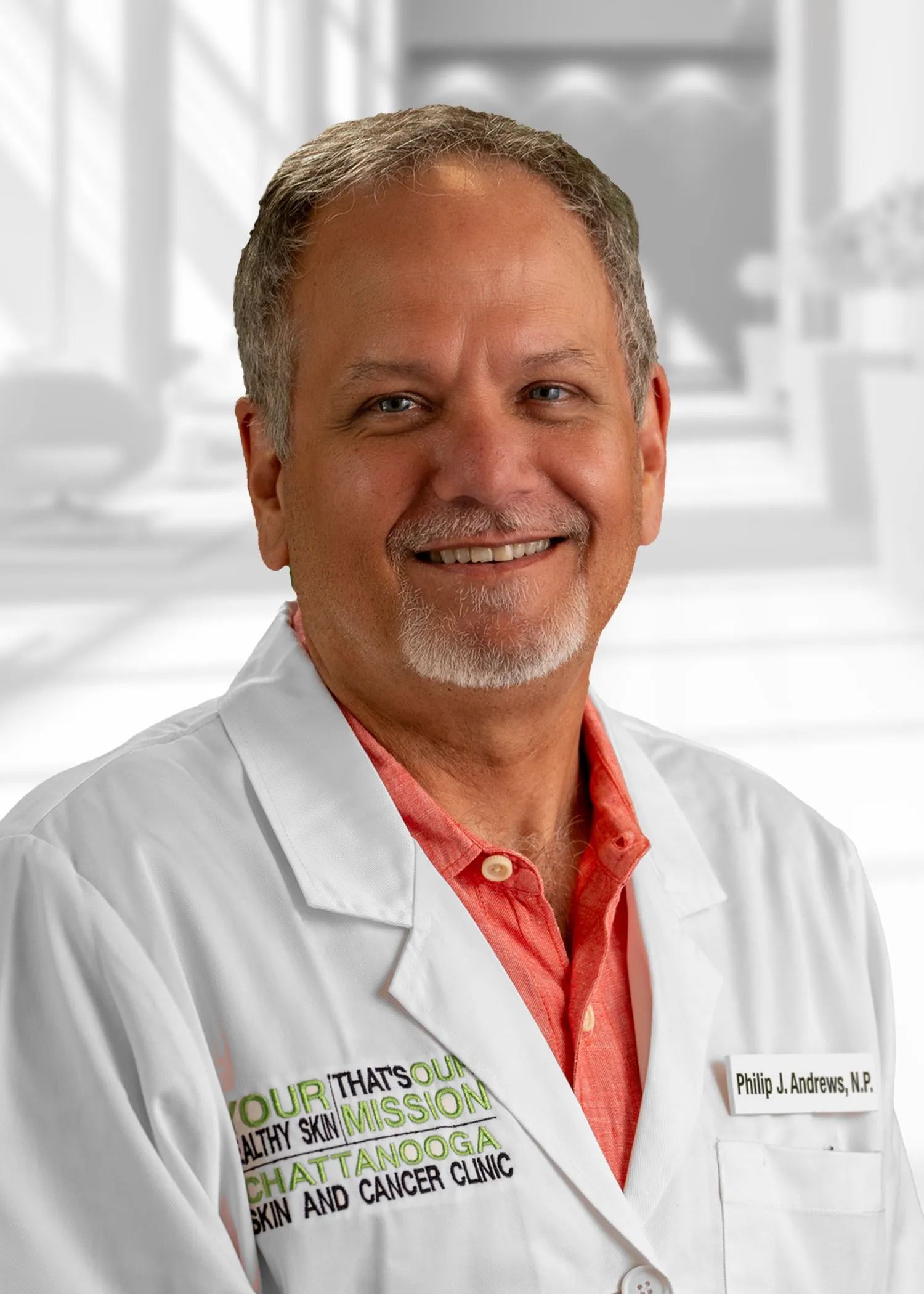 Smiling man in medical attire
