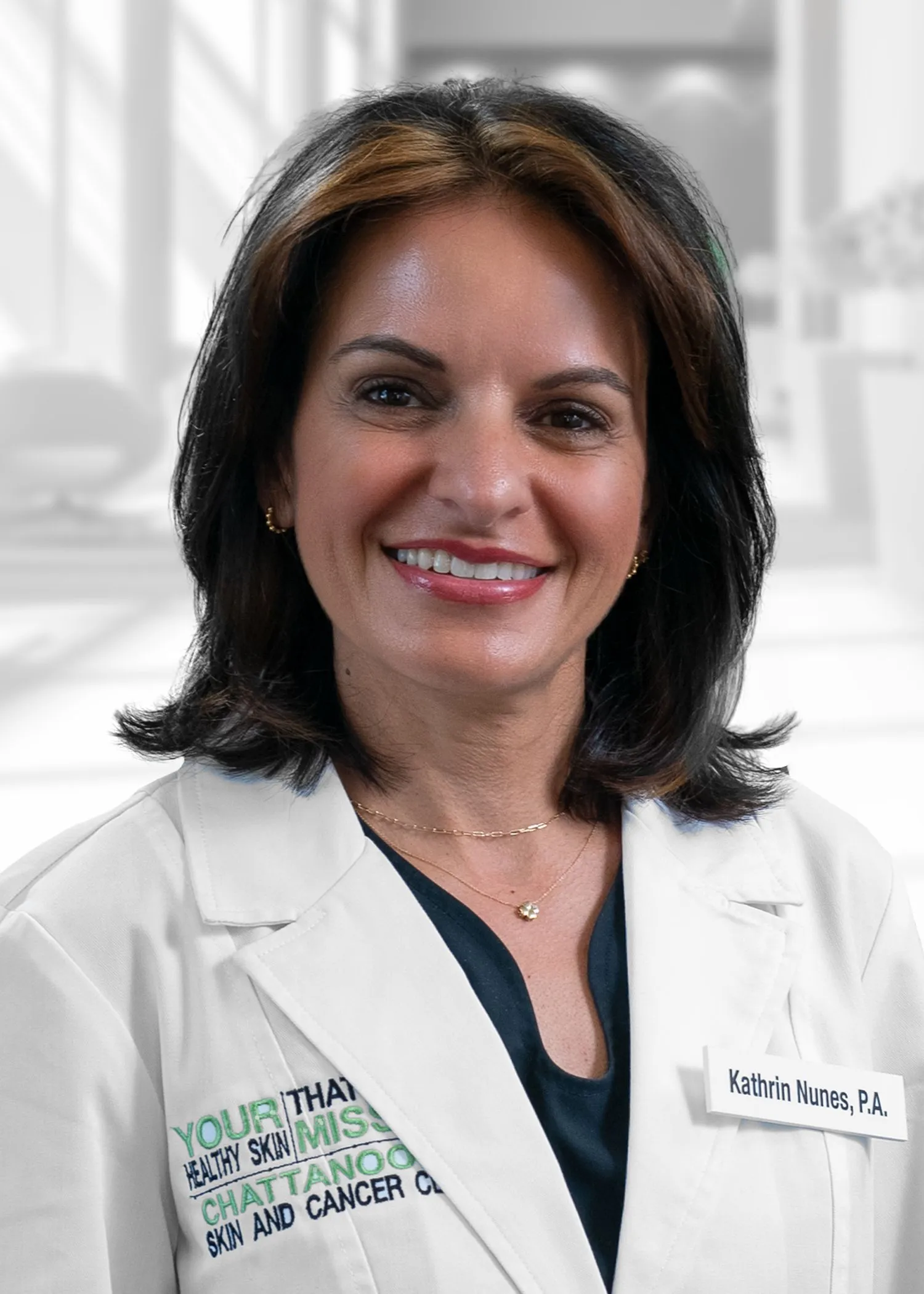 Smiling woman in medical attire