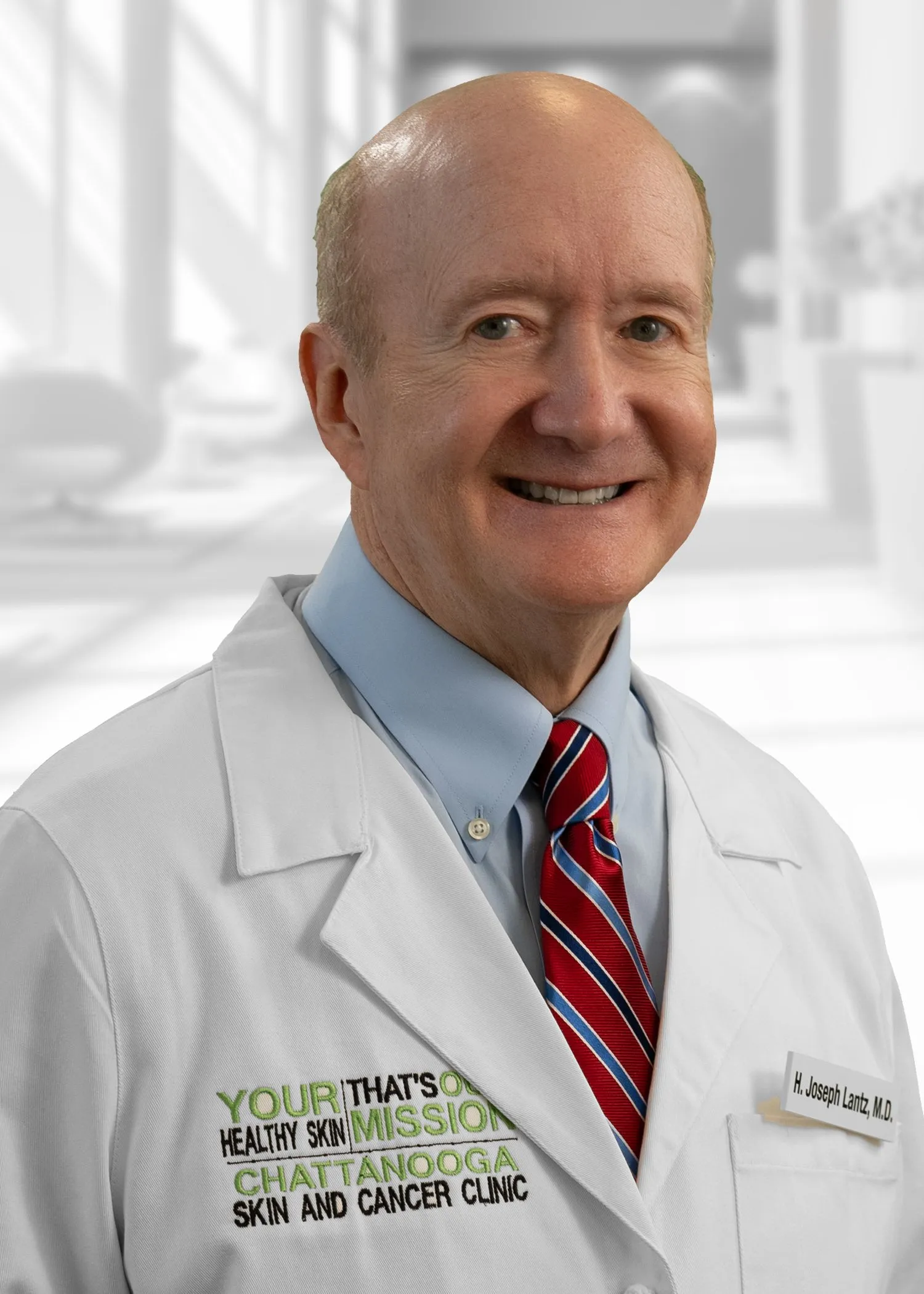 Smiling doctor in white coat