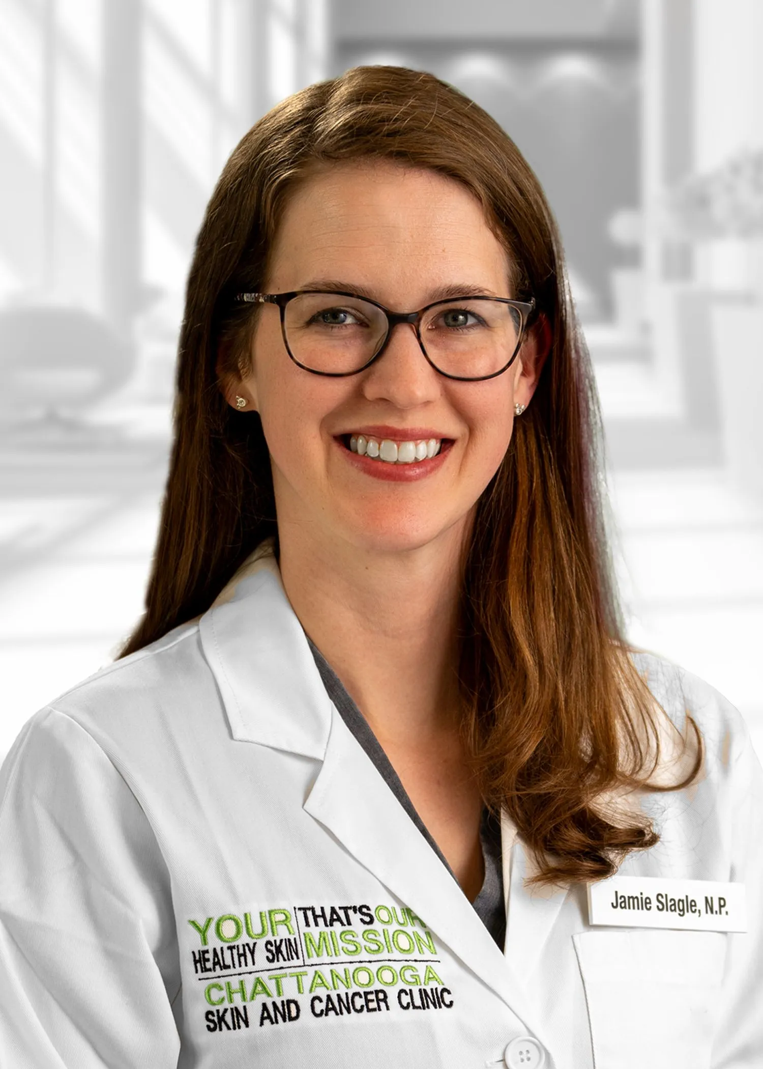 Smiling woman in medical attire