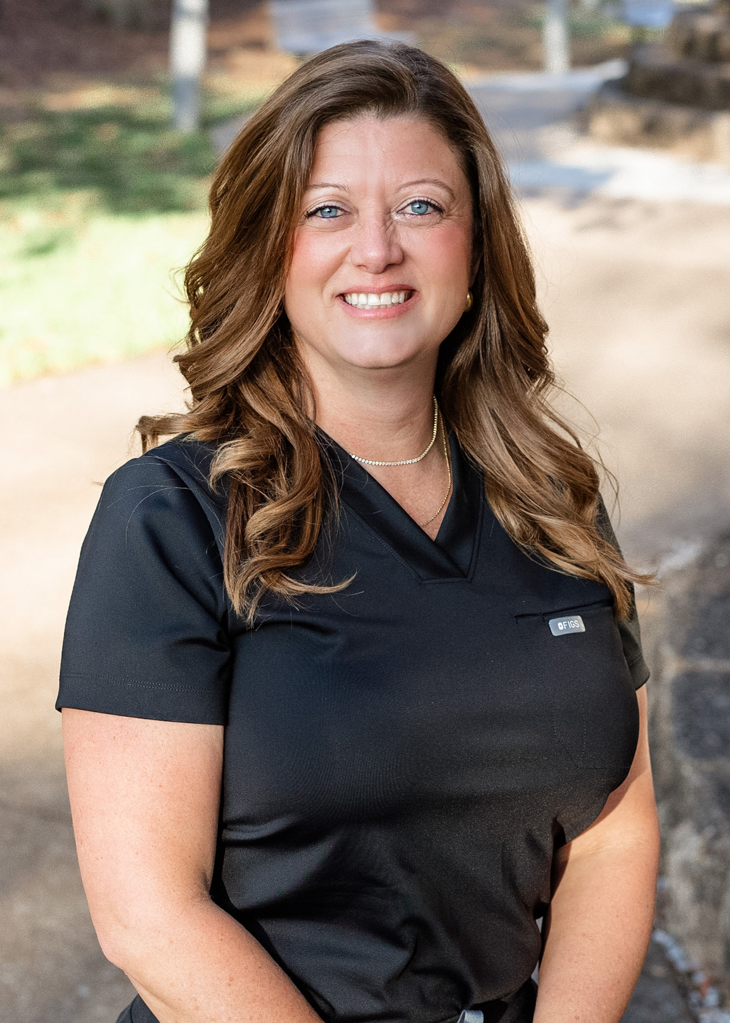 Smiling woman in a black shirt